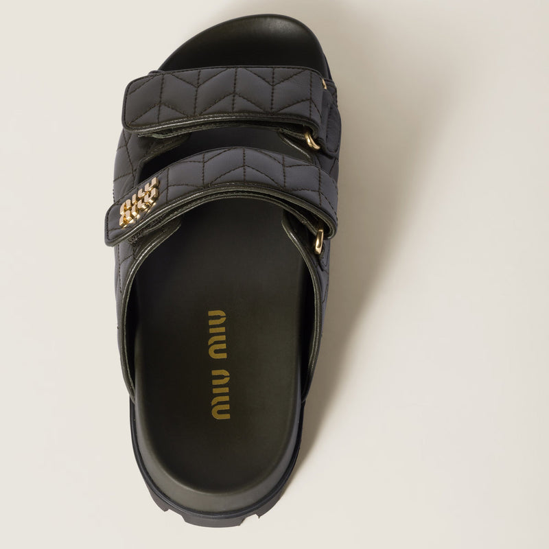 Miu Miu - Mules en cuir nappa matelassé Vert Loden