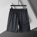 Burberry - Shorts avec motif monogramme et bande colorée - Noir