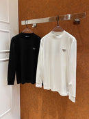 Prada - Pull en coton orné du logo Prada. Noir ou Blanc