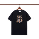 Burberry - T-shirt Burberry avec logo monogramme en tartan - Noir