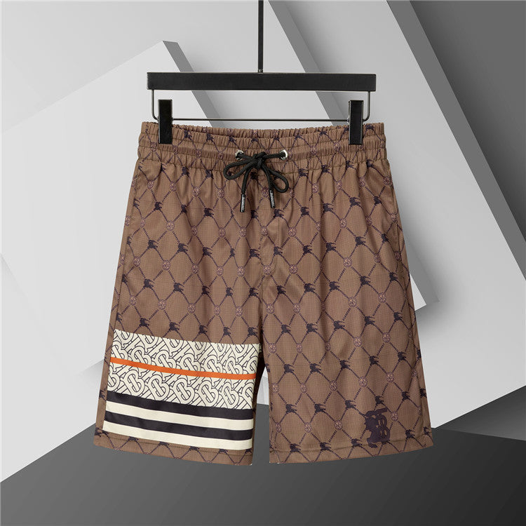 Burberry - Shorts avec motif monogramme et bande colorée - Marron