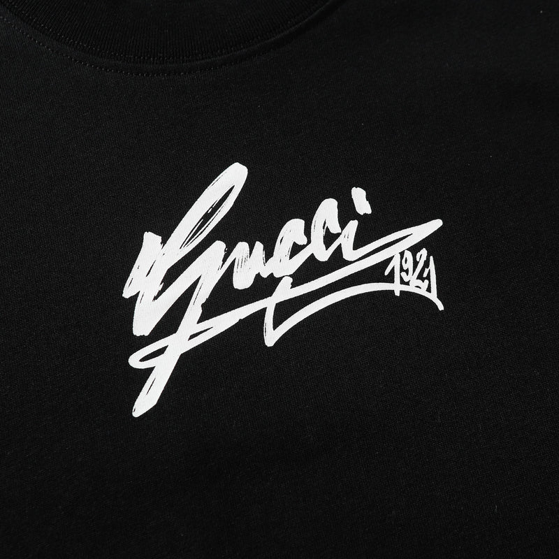 Gucci - T-shirt avec logo Gucci 1921 - Noir