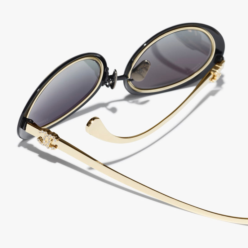 Chanel - Lunettes de soleil ovales Noir & Or