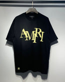 Amiri - T-shirt en coton écriture coloré Noir/Jaune