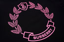 Burberry - T-shirt Burberry avec logo sur la poitrine et motif de laurier à l'arrière - Noir