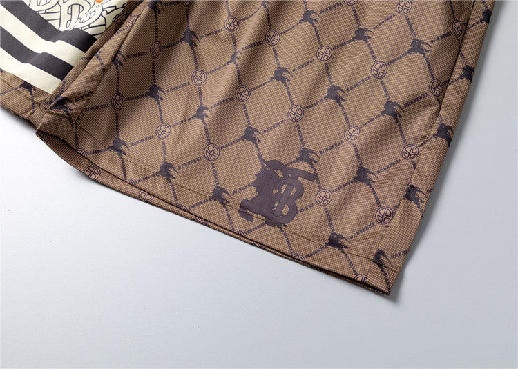 Burberry - Shorts avec motif monogramme et bande colorée - Marron