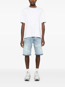 Amiri - Short en jean à logo brodé