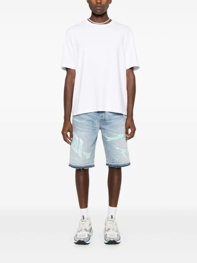 Amiri - Short en jean à logo brodé