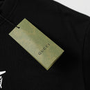 Gucci - T-shirt avec logo Gucci 1921 - Noir