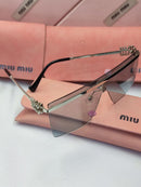 Lunette Miumiu en Gris