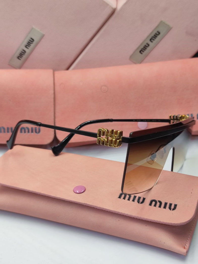 Lunette Miumiu en Noir et Gold
