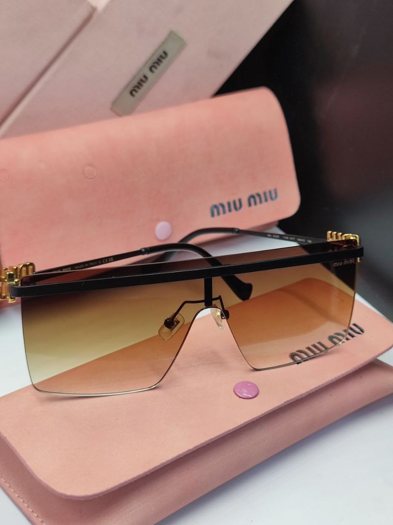 Lunette Miumiu en Noir et Gold