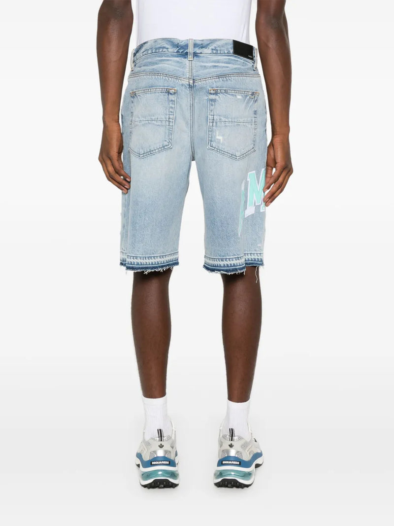 Amiri - Short en jean à logo brodé