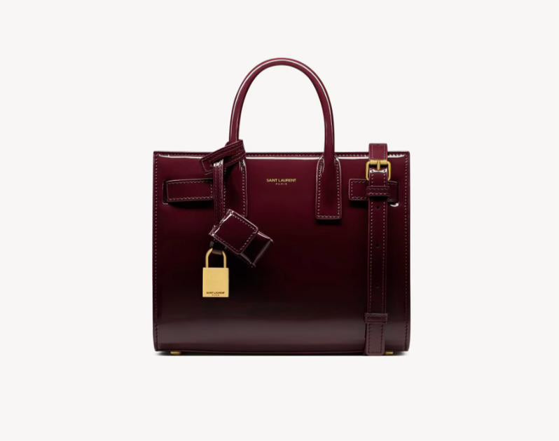 Yves Saint Laurent - SAC DE JOUR NANO EN CUIR VERNI
DARK RED WINE