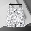 Burberry - Shorts Burberry avec motif monogramme noir et blanc - Blanc