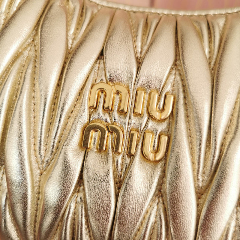 Miumiu - Wander matelassé nappa leather hobo Gold