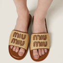 Miu Miu - Mules en tissu effet raphia Naturel