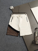 Fendi - Shorts avec détail en monogramme FF et bande jaune - Noir et Blanc