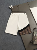 Fendi - Shorts avec détail en monogramme FF et bande jaune - Noir et Blanc