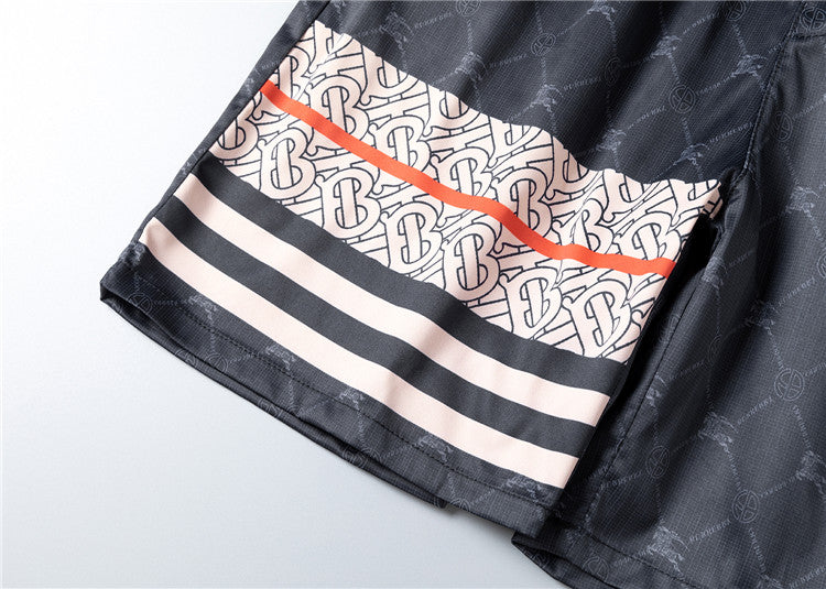 Burberry - Shorts avec motif monogramme et bande colorée - Noir