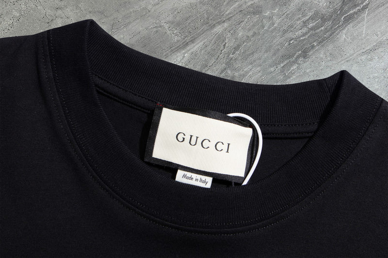 Gucci - T-shirt avec un design illustré et logo Gucci - Noir