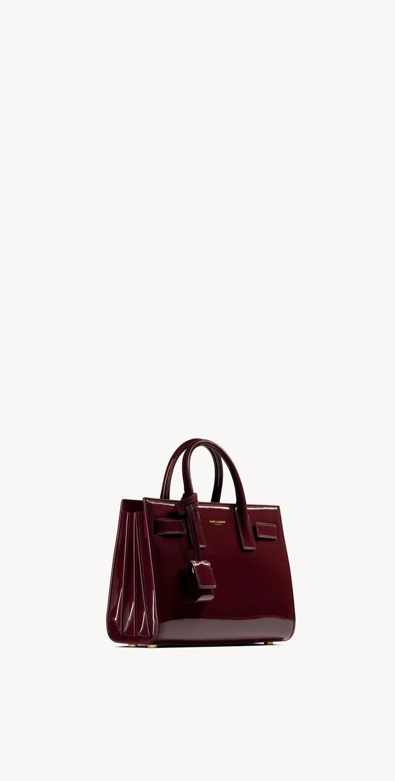 Yves Saint Laurent - SAC DE JOUR NANO EN CUIR VERNI
DARK RED WINE