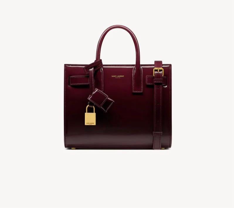 Yves Saint Laurent - SAC DE JOUR NANO EN CUIR VERNI
DARK RED WINE