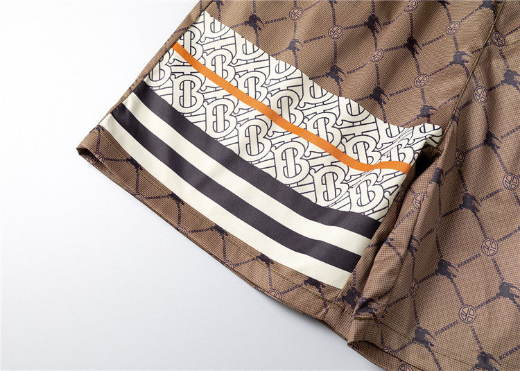 Burberry - Shorts avec motif monogramme et bande colorée - Marron