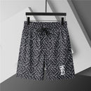 Burberry - Shorts Burberry avec motif monogramme noir et blanc - Noir