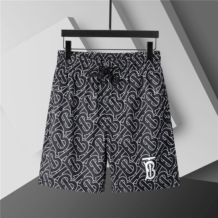 Burberry - Shorts Burberry avec motif monogramme noir et blanc - Noir
