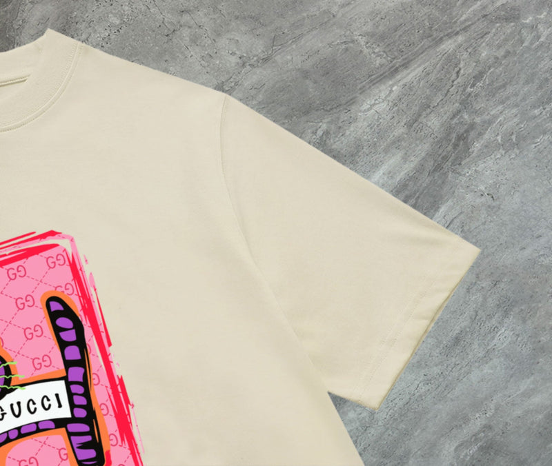 Gucci - T-shirt avec un design coloré et logo Gucci - Crème