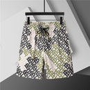 Burberry - Shorts avec motif monogramme en plusieurs couleurs