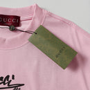 Gucci - T-shirt avec logo Gucci 1921 - Rose