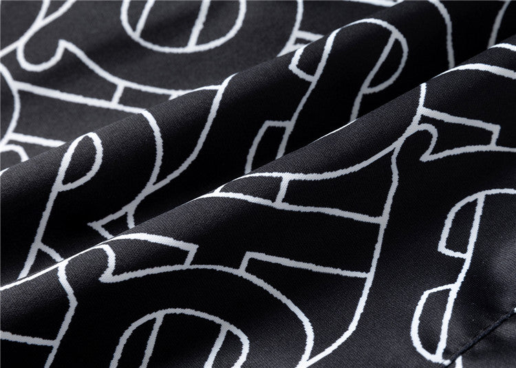 Burberry - Shorts Burberry avec motif monogramme noir et blanc - Noir