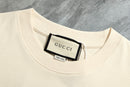 Gucci - T-shirt avec un design illustré et logo Gucci - Crème
