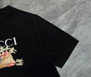 Gucci - T-shirt avec un design illustré et logo Gucci - Noir