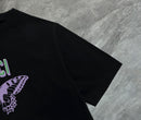 Gucci - T-shirt avec un design de papillon et logo Gucci - Noir