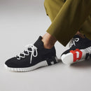 Hermès - Sneakers slip-on Lift Noir/Orange