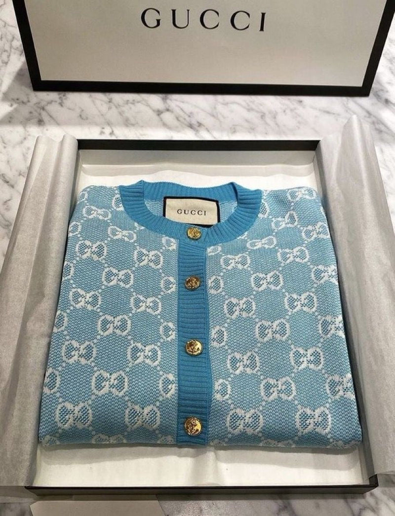 Gucci - Pull en laine à bouton doré Bleu