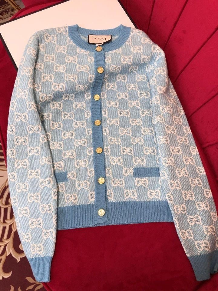 Gucci - Pull en laine à bouton doré Bleu