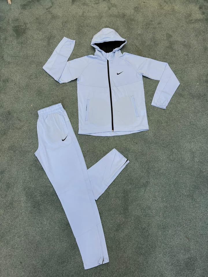 Nike - Survêtement Running Haut & Bas Bleu Ciel