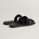 Hermès - Sandales Oran Noir en toile H effrangée