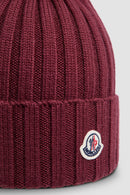 Moncler - Bonnet en laine avec pompon Bordeaux