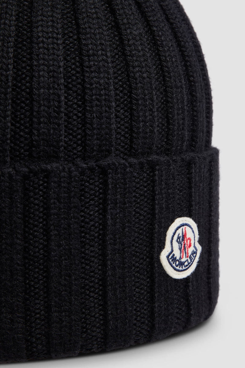 Moncler - Bonnet en laine avec pompon Noir