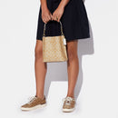 Mollie Bucket Bag 22 In Signature Canvas