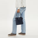 Mollie Bucket Bag 22 In Signature Canvas