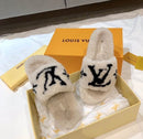 Louis Vuitton - Mules Fourrure Beige